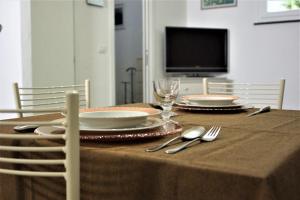 Telewizja i/lub zestaw kina domowego w obiekcie Maison Beauregard