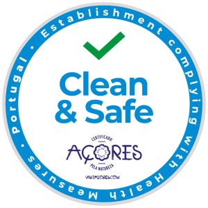 a label with the clean and safe acorenes logo at Pinneapple Studio in Ponta Delgada