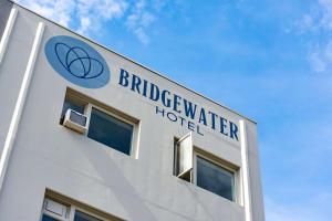 a building with a sign on the side of it at Bridgewater Hotel, Trademark Collection by Wyndham in Fairbanks