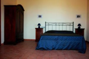 A bed or beds in a room at Villa Rica
