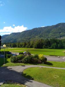 a view of a parking lot with mountains in the background at OURSONS 1 in Morillon