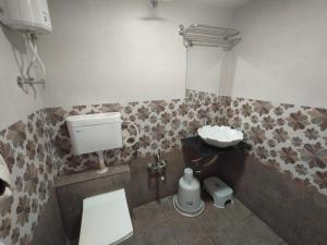 Vannituba majutusasutuses Hotel Neelkamal