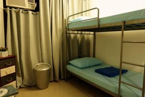 Tempat tidur dalam kamar di Mactan District Budgetel - Lapu Lapu Cebu