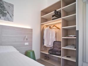 Кровать или кровати в номере Hotel Medusa