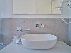 Ванная комната в Hotel Medusa