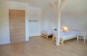 Posteľ alebo postele v izbe v ubytovaní Resort Erich