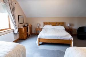 Voodi või voodid majutusasutuse Twin Peaks B&B toas