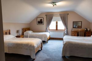 Voodi või voodid majutusasutuse Twin Peaks B&B toas