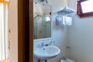 Kúpeľňa v ubytovaní Hotel Riviera + 37 fotografií
