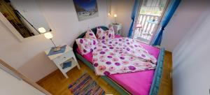Postel nebo postele na pokoji v ubytování Apartmani Luja