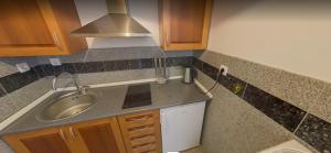 Kuchyň nebo kuchyňský kout v ubytování Apartmani Luja + 36 fotografií
