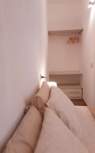 Ένα ή περισσότερα κρεβάτια σε δωμάτιο στο AL PEZ exclusive rooms