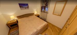 Postel nebo postele na pokoji v ubytování Apartmani Luja