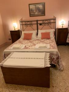 Posteľ alebo postele v izbe v ubytovaní Casa del Capitano Rocca d'Orcia