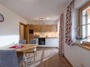 Kuchyň nebo kuchyňský kout v ubytování Bergappartements Reithammer - Ellmau