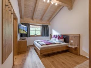 Postel nebo postele na pokoji v ubytování Bergappartements Reithammer - Ellmau