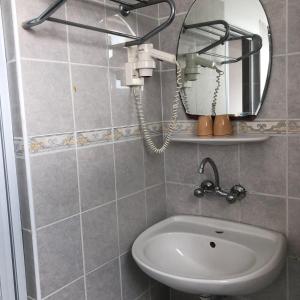A bathroom at Sunny Varshava Hotel
