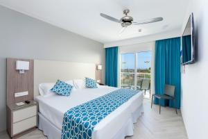 Postel nebo postele na pokoji v ubytování Hotel Riu Papayas - All Inclusive