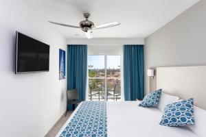 Postel nebo postele na pokoji v ubytování Hotel Riu Papayas - All Inclusive