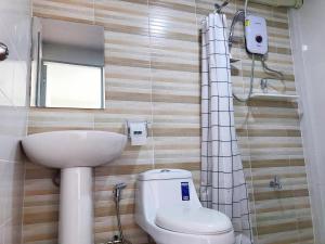 Koupelna v ubytování Punyin Hotel Inthanon -ปั้นหยิ่น โฮเทล