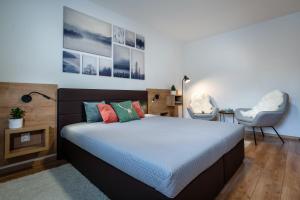 
Posteľ alebo postele v izbe v ubytovaní FLEXI HOME - Bellová
