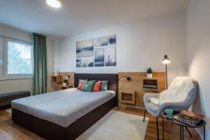 Postel nebo postele na pokoji v ubytování FLEXIHOME sk - Bellova - Brand New - Neftflix - Private Parking