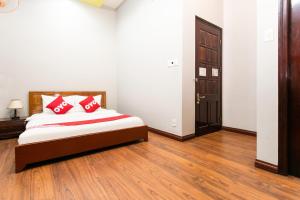 Postel nebo postele na pokoji v ubytování Honey Hotel Da Nang