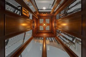 a view from the top of a building with wooden floors and windows at Belle Epoque Suites in Athens