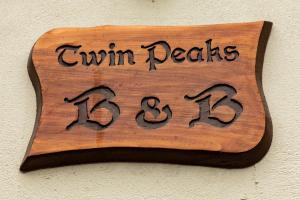 Majutusasutuses Twin Peaks B&B olev sertifikaat, autasu, silt või muu dokument