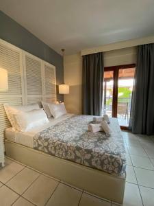 Postel nebo postele na pokoji v ubytování Hotel Magdalena