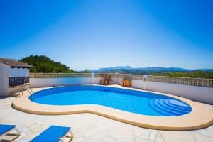 a swimming pool on the roof of a house at Mirador al Sur in Moraira