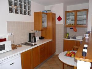 Kuchyňa alebo kuchynka v ubytovaní Raday Central Apartment