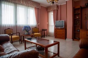 TV a/nebo společenská místnost v ubytování Pico da Costa