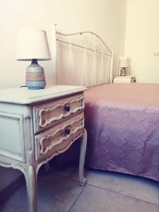 A bed or beds in a room at La Nuova Casetta