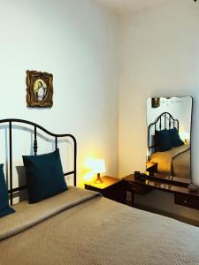 Postel nebo postele na pokoji v ubytování Rifugio a Mottola