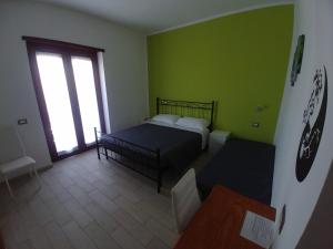 Postel nebo postele na pokoji v ubytování Bonsai Bed & Breakfast