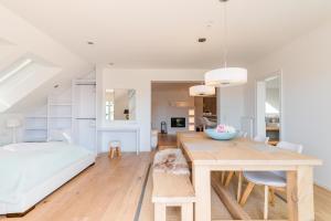 Ein Bett oder Betten in einem Zimmer der Unterkunft Belle Maison - Das kleine Hotel