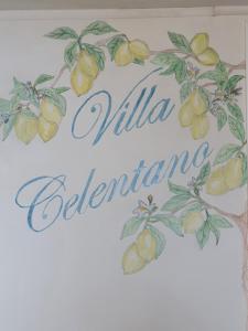 a sign for a kitchen with a lemon tree at Villa Celentano in Positano