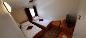Postel nebo postele na pokoji v ubytování Restaurant and rooms Kotlar