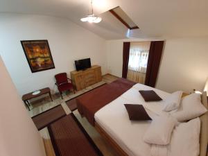 Postel nebo postele na pokoji v ubytování Restaurant and rooms Kotlar