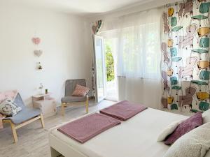 Posteľ alebo postele v izbe v ubytovaní Apartment GardenView - New!