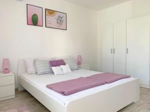 Posteľ alebo postele v izbe v ubytovaní Apartment GardenView - New!