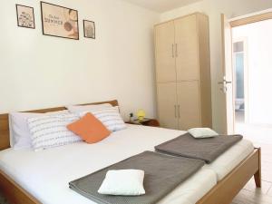 Posteľ alebo postele v izbe v ubytovaní Apartment GardenView - New!