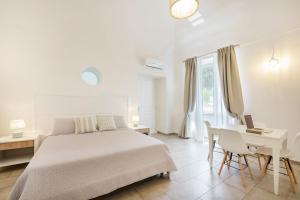 Le Volte Procida Home客房内的一张或多张床位