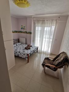 Postel nebo postele na pokoji v ubytování Villa Natali