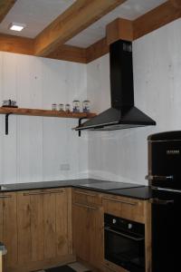 Η κουζίνα ή μικρή κουζίνα στο B&B Heeringhuusen