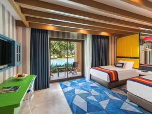 Postel nebo postele na pokoji v ubytování Rixos Premium Belek - The Land of Legends Access + 37 fotografií