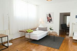 En eller flere senge i et værelse på City Wohnung K2 KLIMATISIERT