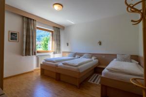 Postel nebo postele na pokoji v ubytování Residence Sporting