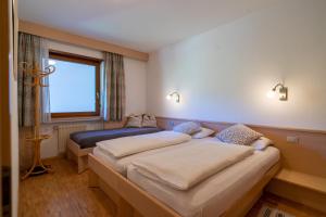 Postel nebo postele na pokoji v ubytování Residence Sporting